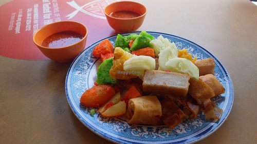 Mantou mezze with satay rice block and bean curd at Southern Palace in East Singapore