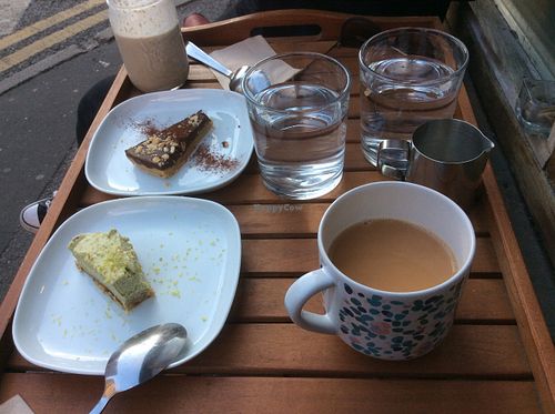 So in need of cake was I that I ate most before remembering to take a photo. Key lime pie, peanut choc slice and an Earl Grey redbush tea, 👍 at Smashing Kitchen in East London