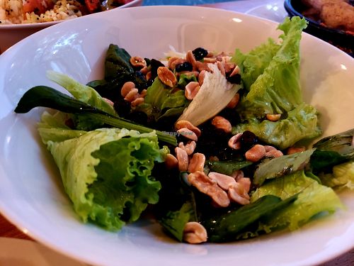 greens and dried fruit. only dried fruit were raisins. probably best to just get salad at La Temeraria in Montevideo