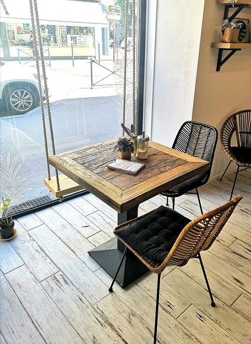 In the window, a swing in place of a chair! at Kia Ora in Annecy