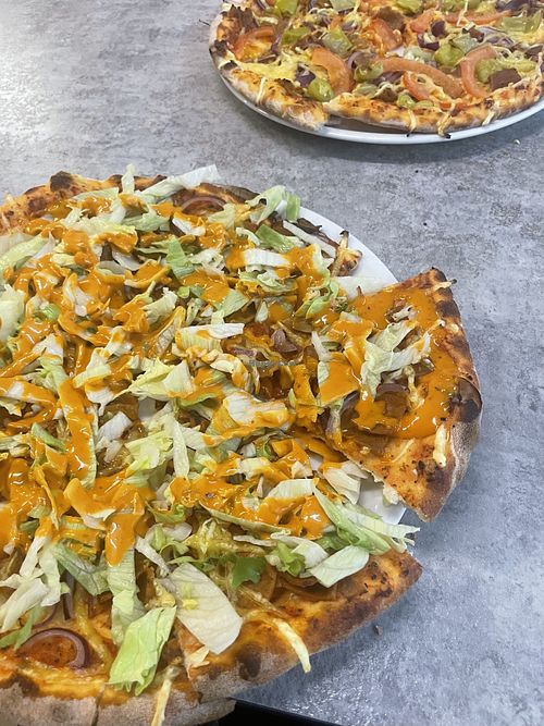 Vegan burgerpizza + Vegan Vönerpizza  at Energia Lounas Ravintola in Lahti