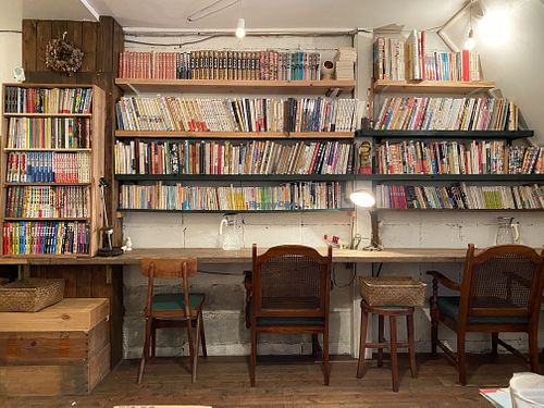 Cozy indoor setting with lots of books at Hobodo Cafe in Kyoto