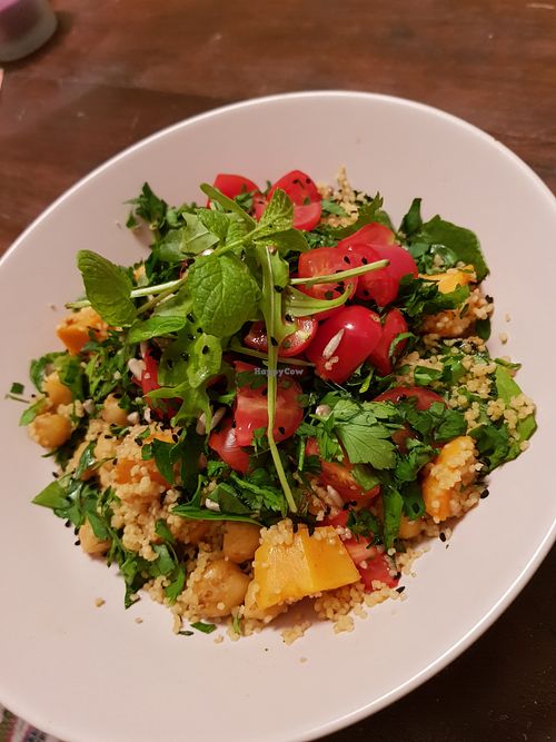 Spiced couscous salad w sweet potato, spinach & cherry toms at Sally's Arhondiko in Ios