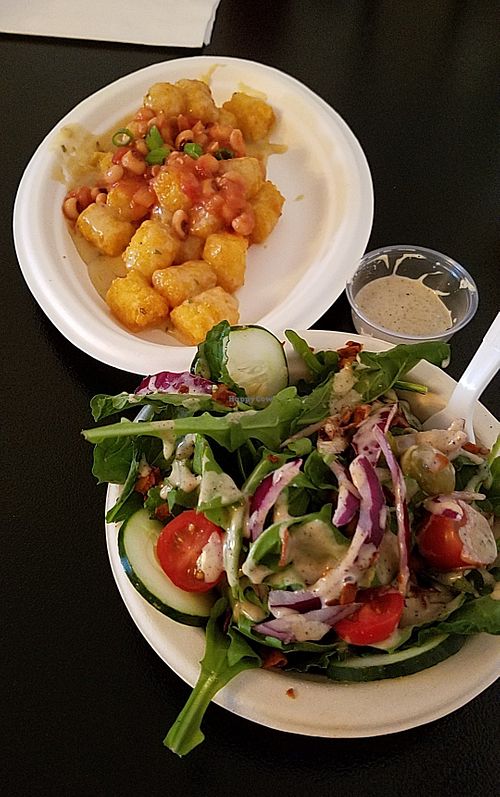 Tater tots like none other and great side salad with honey mustard dressing...loved it all🤗 at Vegelicious in Nashville