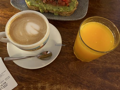 Coffee with soy milk and fresh squeezed OJ  at Alabama Cafe in San Sebastian