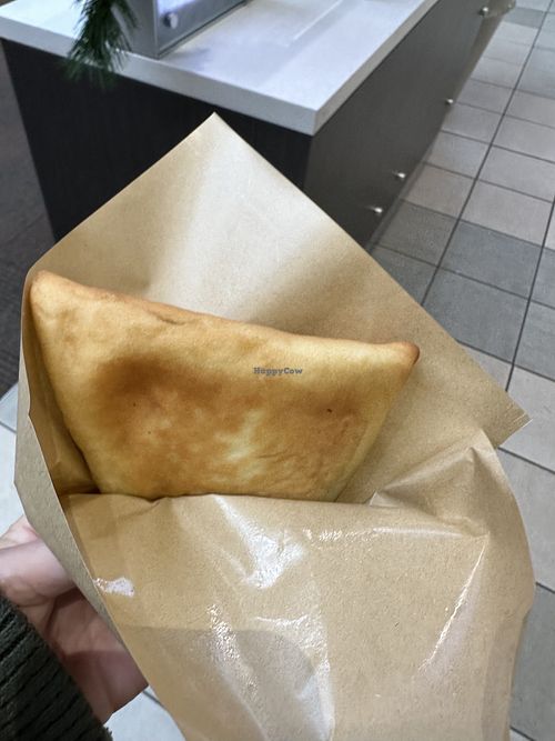 Spinach pie from bread bites   at Meridian Township Farmers' Market in Okemos