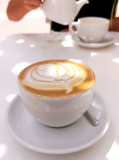 Cappuccino with oat milk at Brumes in Annecy