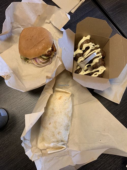 Burger, wrap and potatoes  at Jomm in Reykjavik