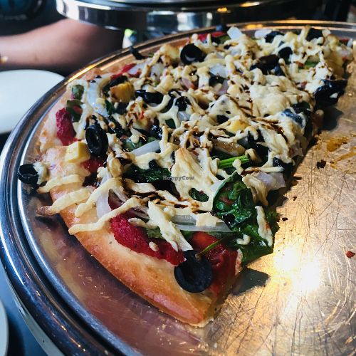 Vegan pizza on gluten free crust!!  at 49 Degree North Pizza in Waterton Park