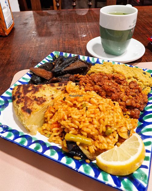 Tortilla, berenjenas, lentejas y arroz tipo paella at El Piano in Granada