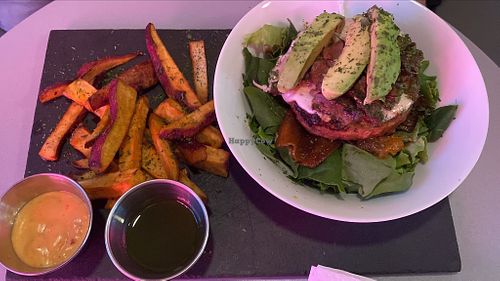 Bunless burger over salad (GF). at Gia Vegan Pastries in San Pedro