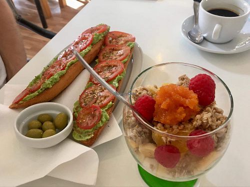 Soy yoghurt with fruit & musli, vegan toasts with avocado and tomato   at Bar Poxé in Mallorca
