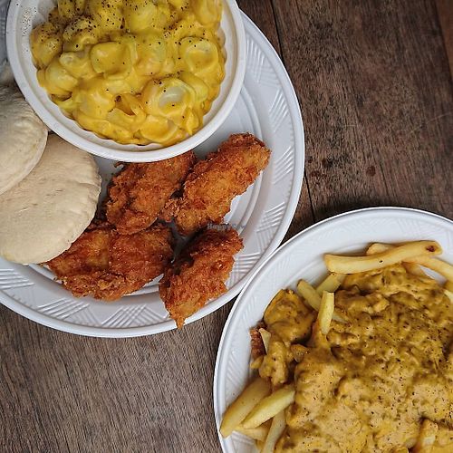 Fried chicken, mac and cheese, biscuits, and voodoo fries at Herbivora in Ho Chi Minh City