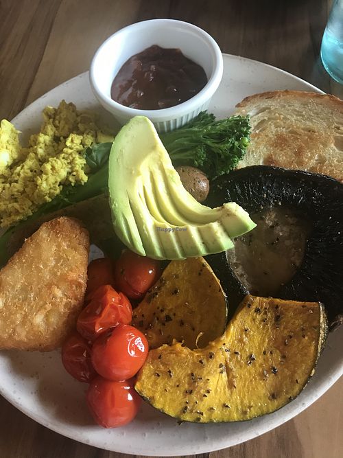 Big Breakfast with Tofu Scramble, sausage, sourdough toast, roast tomatoes, pumpkin, mushroom, fresh spinach, avocado, broccolini, and hash brown.  at Yavanna in Paddington