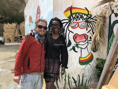 Davide and Michelle, the owners with their own Happy Cow❤️💛💚 at Mad Irie in Crete