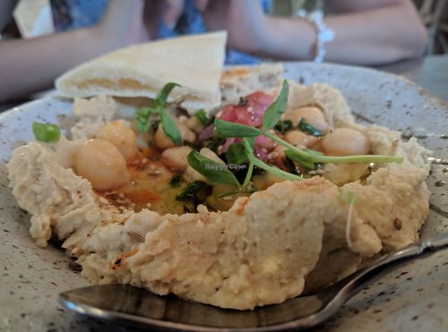 Loads of hummus with 4 pita corners for 750! at Cocomomo & Co in Osaka