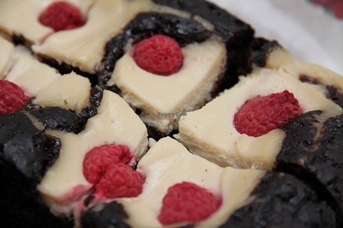 Chocolate brownie with cashew cream cheese and raspberries at Meson Mudejar in Archez