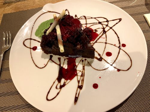 Vegan dessert: chocolate cake with berries  at Da Vinci Italian Restaurant in Aberdeen