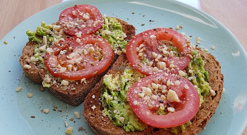 Smashed avocado toast with fresh dukkah at The Black Cockatoo in Almere