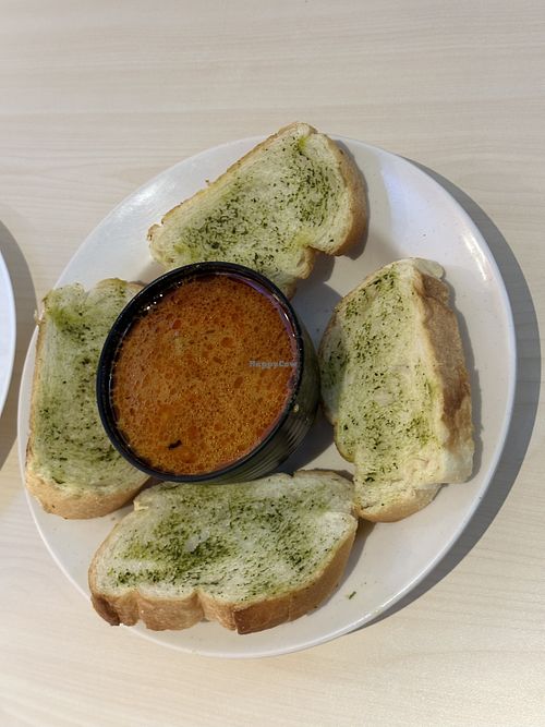 Curry with bread. Bread is soft inside, crispy outside   at Veggie House 一芳 - AMK in Northeast Singapore