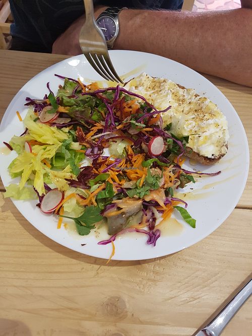 Goats cheese and honey on toast with salad. Delicieux! at Epicerie d'Amont in Mirepoix