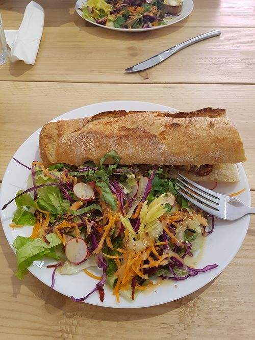 Super tasty vegan hot dog with great mustard/sauce in a fresh baguette ?  at Epicerie d'Amont in Mirepoix