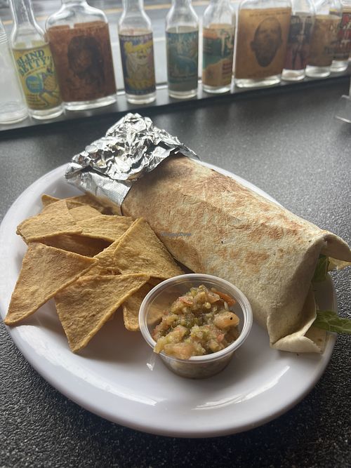 Tofu & veggie burrito (no cheese)— chips & salsa included as a side!   at Railway Cantina in Seward