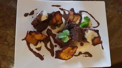Banane plantain brownie,  banane plantain siphon, almond milk and chocolate sauce at Table Metis in Paris