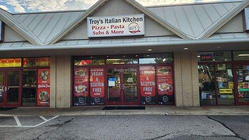 Proudly advertise vegan options at the storefront at Troy's Italian Kitchen in Arlington