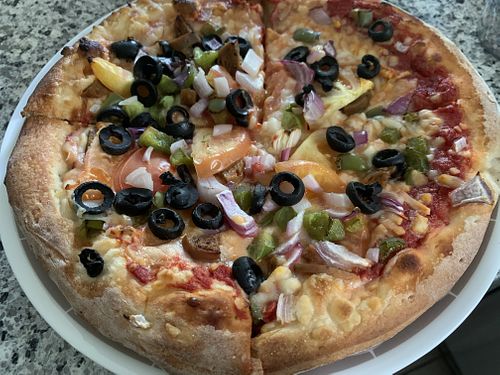 Vegan pizza with veg sausage  at Troy's Italian Kitchen in Arlington