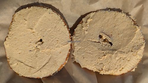 sesame bagel toasted with hummus at Henry Higgins Boiled Bagels - 19th Ave in Portland