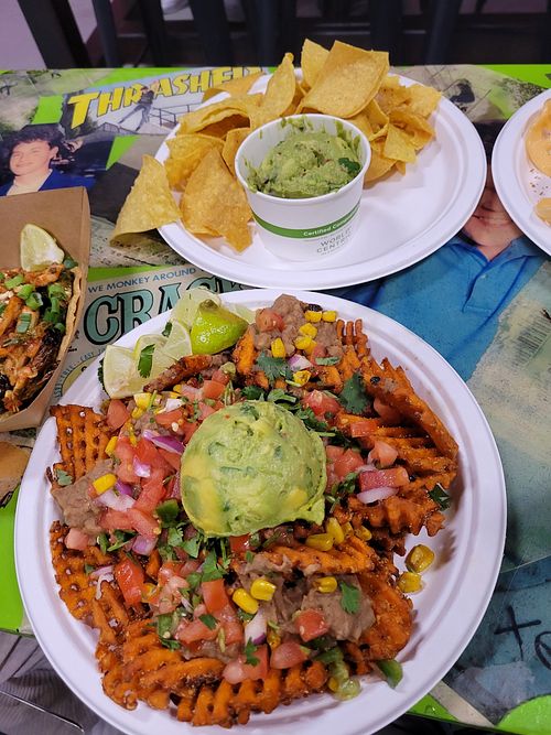 Sweet potato nachos and chips & guac at Rad Dads Tacos and Tequila Bar in Muskegon