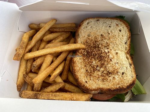 TNK Club Minus Onions- Super Satisfying and TASTY- recommend! Fries were good too!  at TNK Vegan Cafe in Modesto