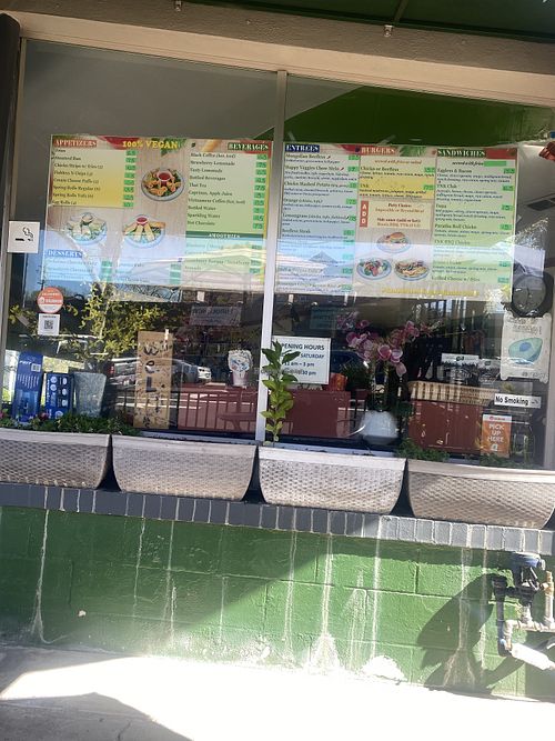 Outdoor Menu - with lots of vegan/plant-based signage 😌  at TNK Vegan Cafe in Modesto