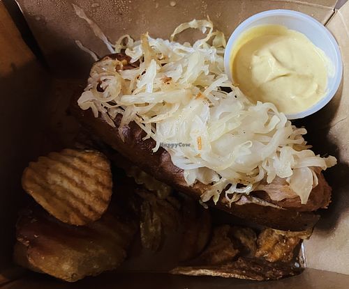 The vegan “old world” brat and chips  at Arrowhead Bike Farm in Fayetteville