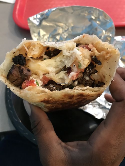 Inside of vegan Cali burrito with azada meat at Guapo's Taco Shop in Bakersfield