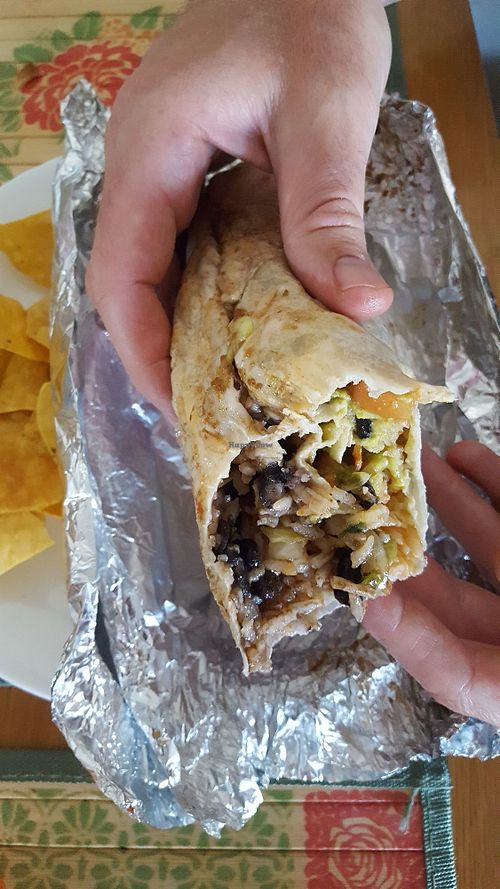 Vegsn tofu, bean, rice and guacamole burrito, no extra charge for guacamole at La Fonda in San Francisco
