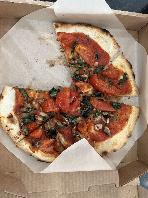 Make your own pizza…they did have vegan cheese but we skipped it. Lots of toppings to choose from but this had roasted tomatoes, basil, and mushrooms.   at EddieWorld in Yermo