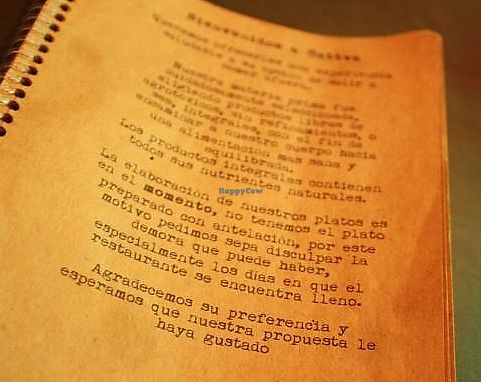 A message on the first page of the menu warning about the organic, integral and slow food that they serve. at Sattva 2 in Buenos Aires