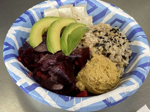 Beet poke bowl... Looks underwhelming at first, but once mixed up with the sauce (that’s kind of on the bottom) it was really good! at Leahi Health - Aina Haina in Honolulu