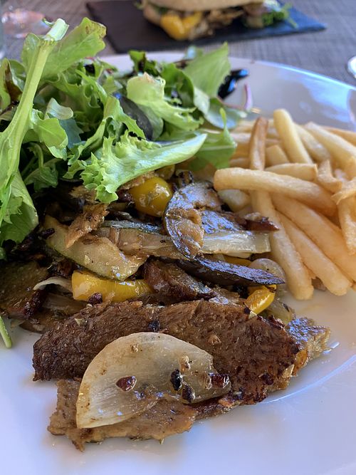 Seitan on a plate with fries.  at Villa 6 in Sintra