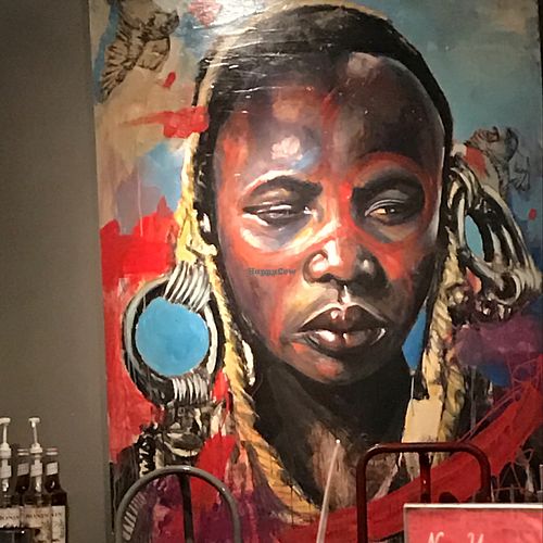 one of ETHOS paintings at the bar at Ethos Vegan Kitchen in Winter Park