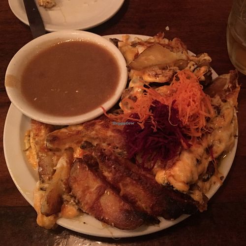 Vegan Poutine-- sesame fries with Daiya cheese and miso gravy at The Naam in Vancouver