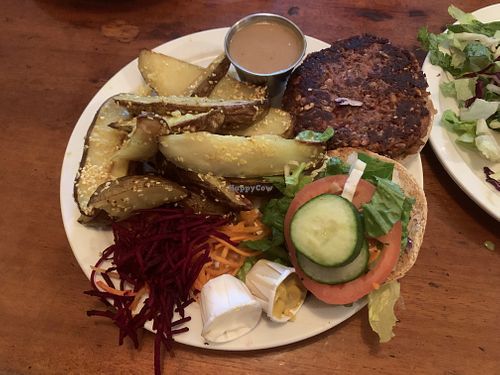 Naam burger with fries   at The Naam in Vancouver
