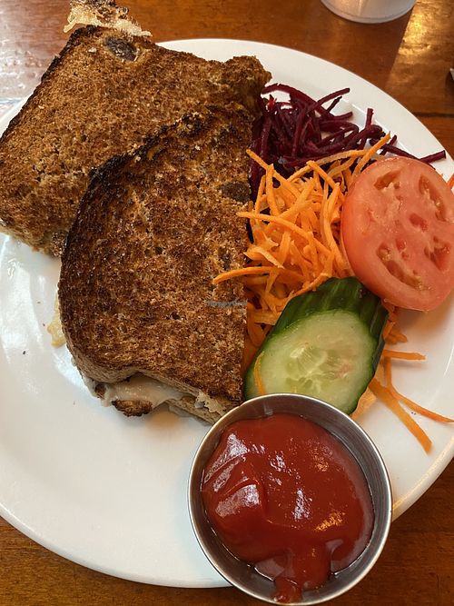 Vegan grilled cheese with extra ketchup   at The Naam in Vancouver