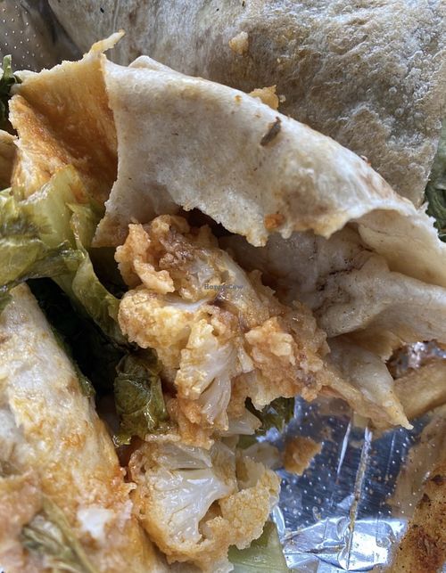 Boolin Buffalo Wrap made with cauliflower not Gardein chkn as the menu described   at Trio Plant-Based in Minneapolis
