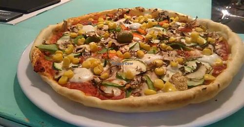 Vegan gluten free pizza with vegetables and vegan cheese at Glutenno in Zagreb