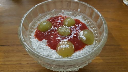 Chia grains and strawberry coulis at 66 Green Restaurant in Perigueux