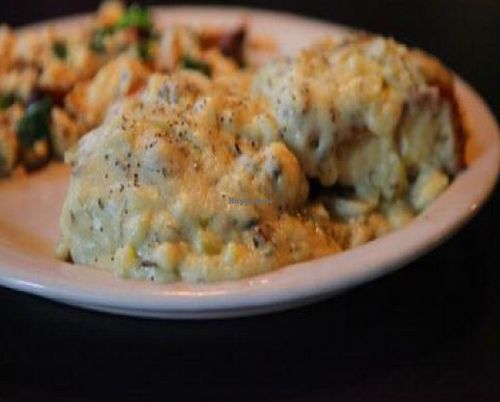 portobello scramble: fresh portobello mushrooms with tofu, garlic, spinach, onion and nutritional yeast. with a house made biscuit and vegan gravy. at Hungry Tiger in Portland