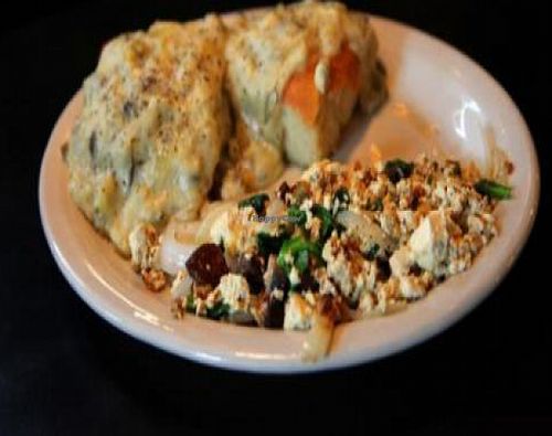 portobello scramble: fresh portobello mushrooms with tofu, garlic, spinach, onion and nutritional yeast. with a house made biscuit and vegan gravy. at Hungry Tiger in Portland